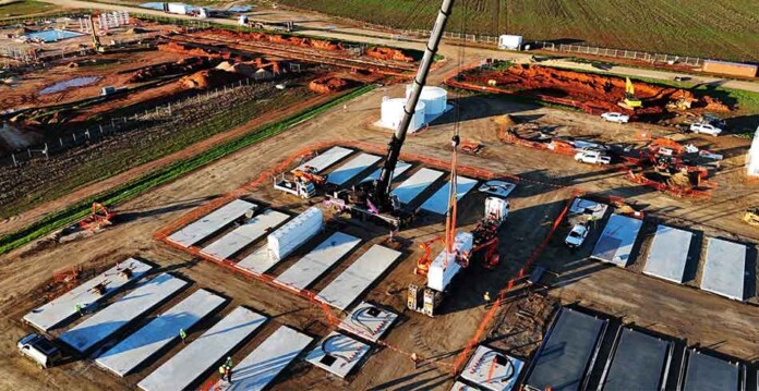 Tesla Megapack being craned into Koorangie Energy Storage System construction site