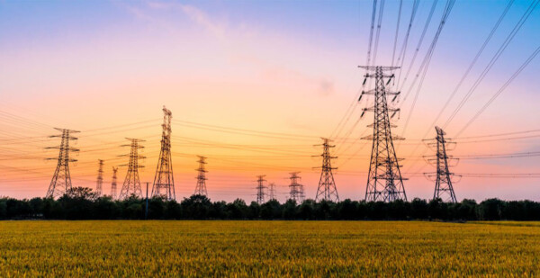 transmission towers against pretty evening sky (supernormal profit)